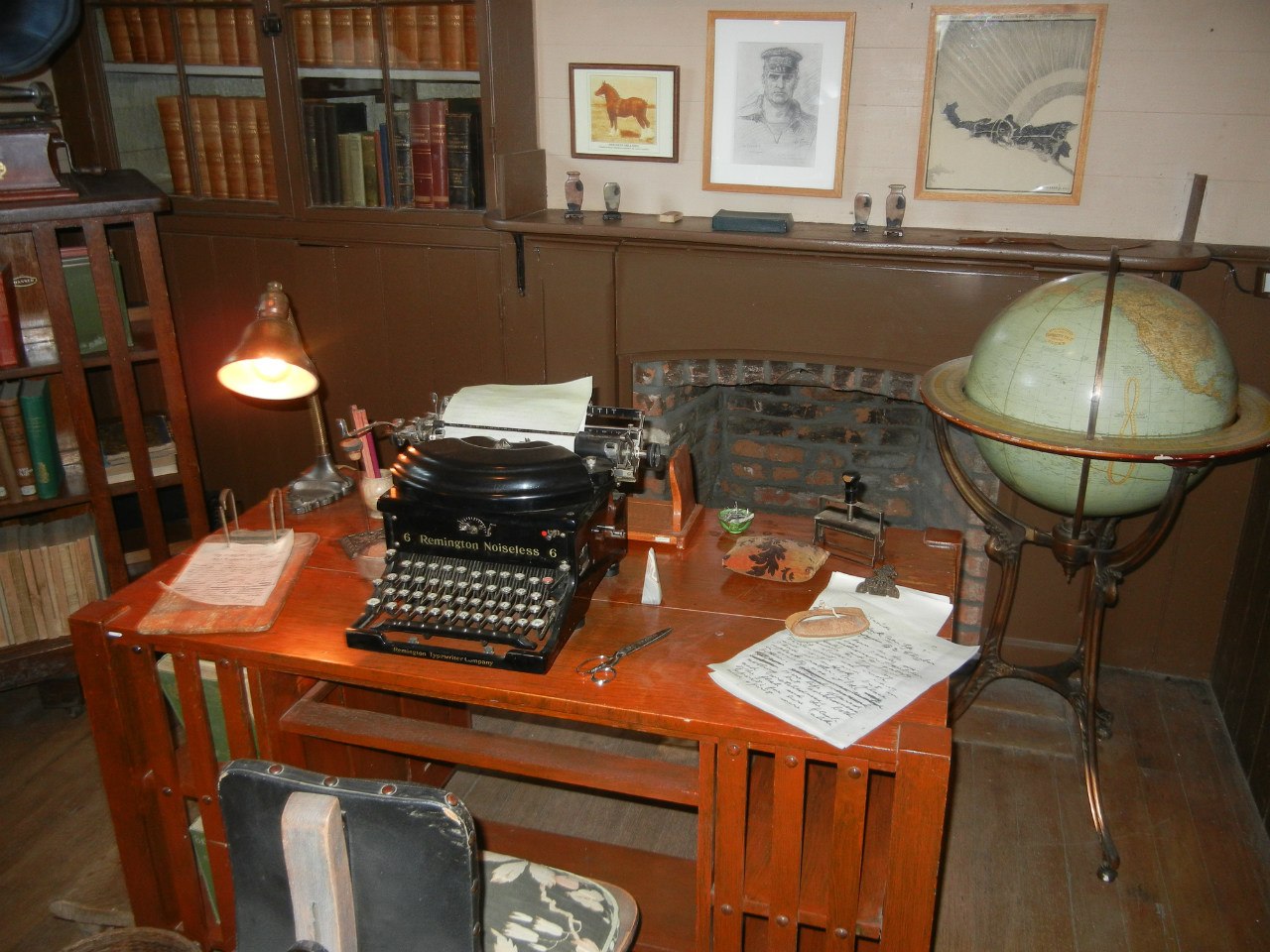 A typewriter on a writing desk